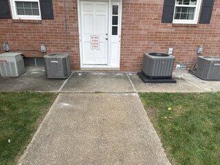 Lifting and stabilizing the back porch of a 4-unit apartment building in Sylvania, OH