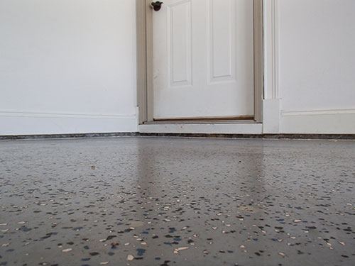 Repairing a cracked driveway in North Ridgeville, OH.