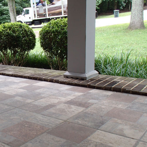 Repairing a cracked driveway in North Ridgeville, OH.