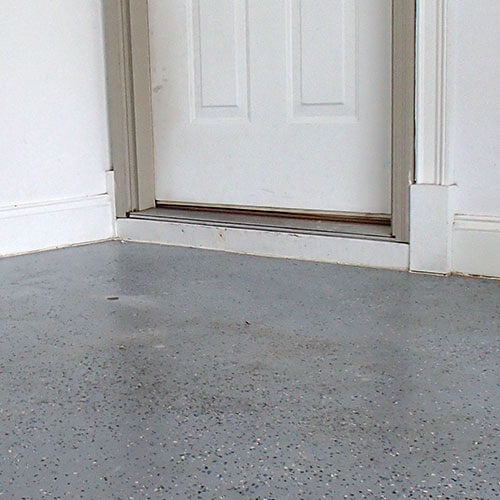 Repairing a cracked driveway in North Ridgeville, OH.