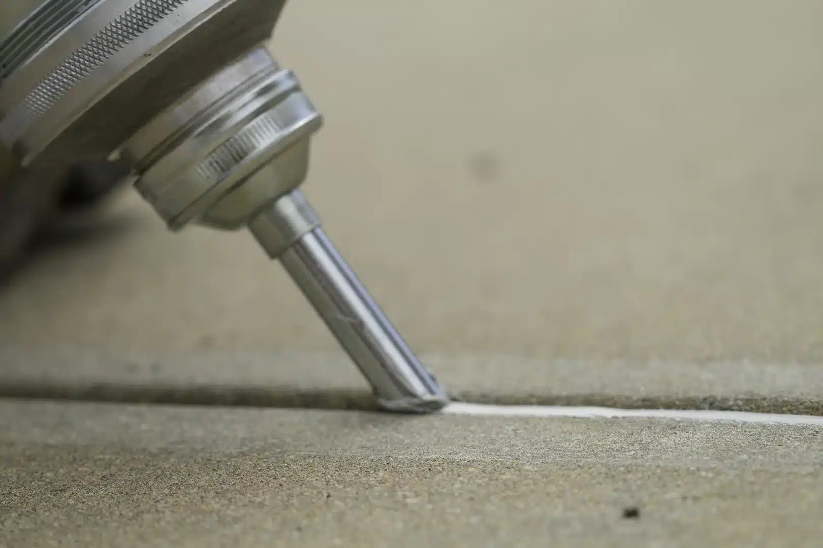 caulking-vs-sealing-concrete-explained-for-homeowners-image concrete joint sealant
