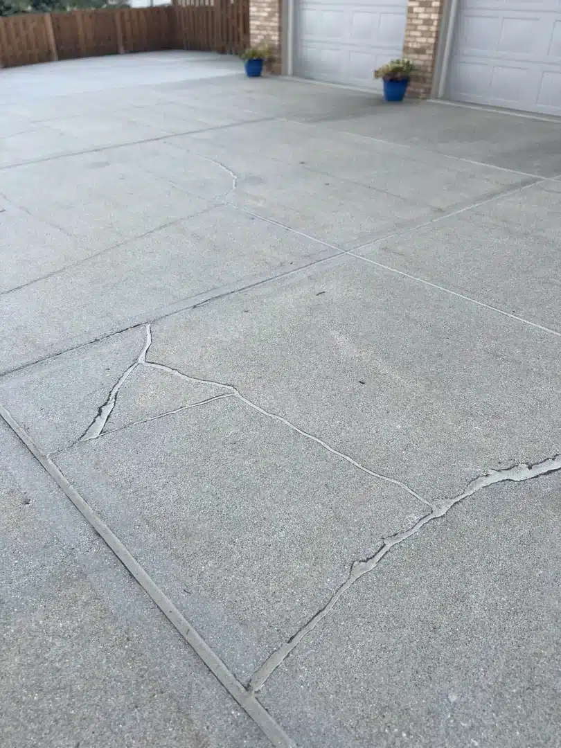 stop-wasting-money-on-temporary-patches-when-you-need-replacement-image cracked concrete driveway